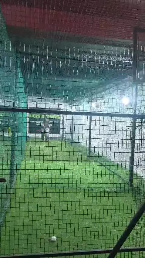 The bowling machine in the Nets & Shots nets